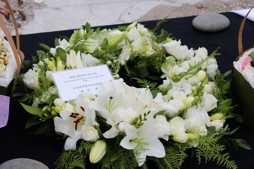 A photograph of a wreath left at the site of the CTV building by Hon. Minoru Kiuchi, the Parliamentary Vice-Minister for Foreign Affairs, Japan.