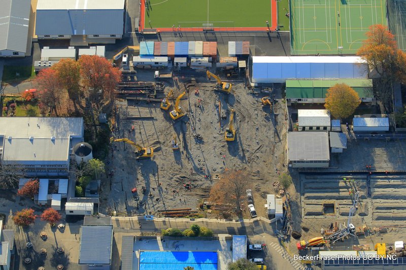 An aerial photo of St Margaret&#x27;s College. There are five diggers visible working on a large gravel construction site.