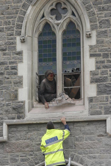 Spigel&#x27;s rescue from cathedral window by police officer on ladder