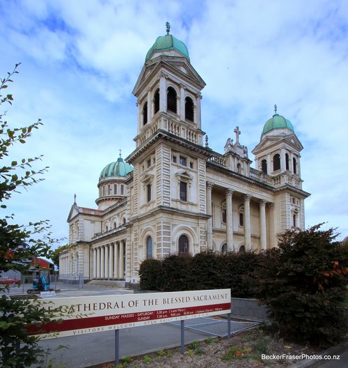 Basilica pre-quake, front view, angled camera shot with sign